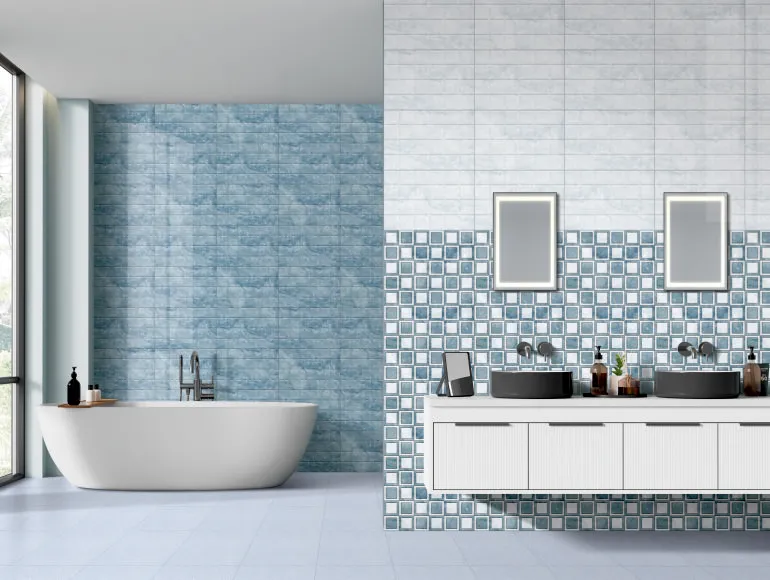 Elegant small blue bathroom with textured and mosaic tile accents